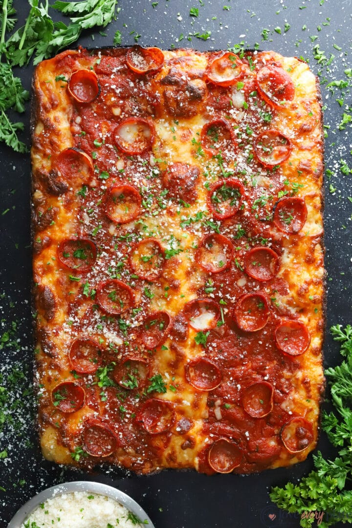 top view of a detroit style pizza with pepperoni and cheese