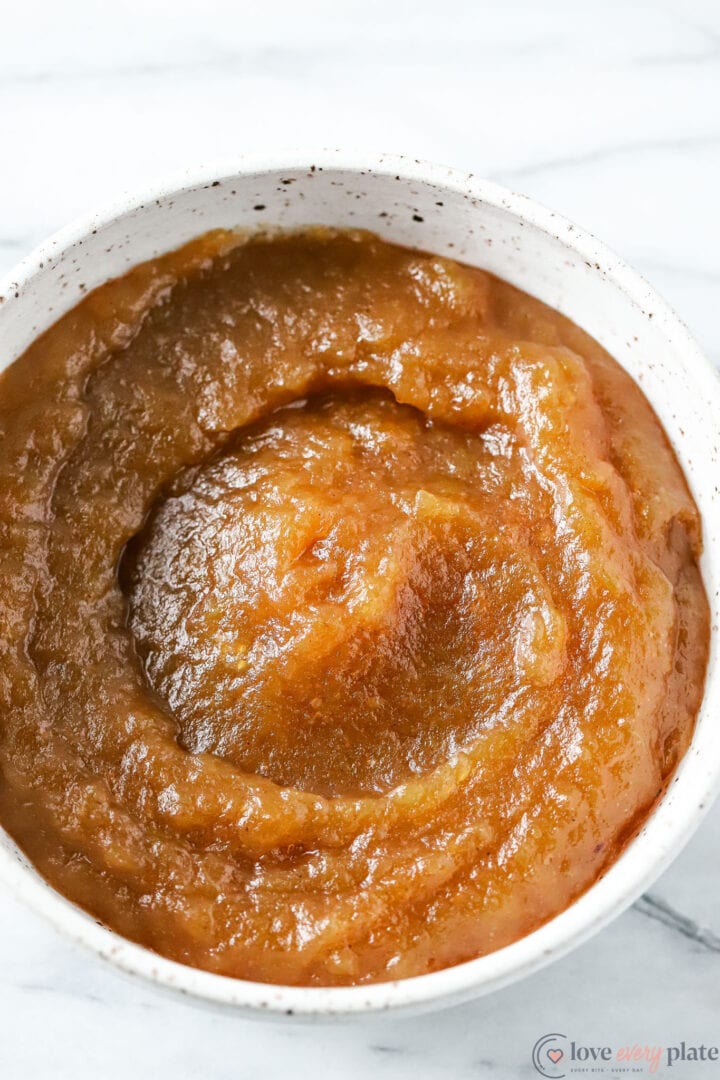 white bowl of apple butter, top view