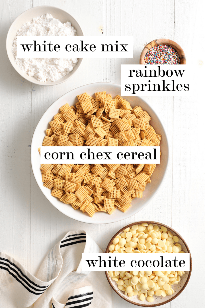 ingredients to make rainbow sprinkle cereal snack, including corn chex, white chocolate, sprinkles, and white cake mix.