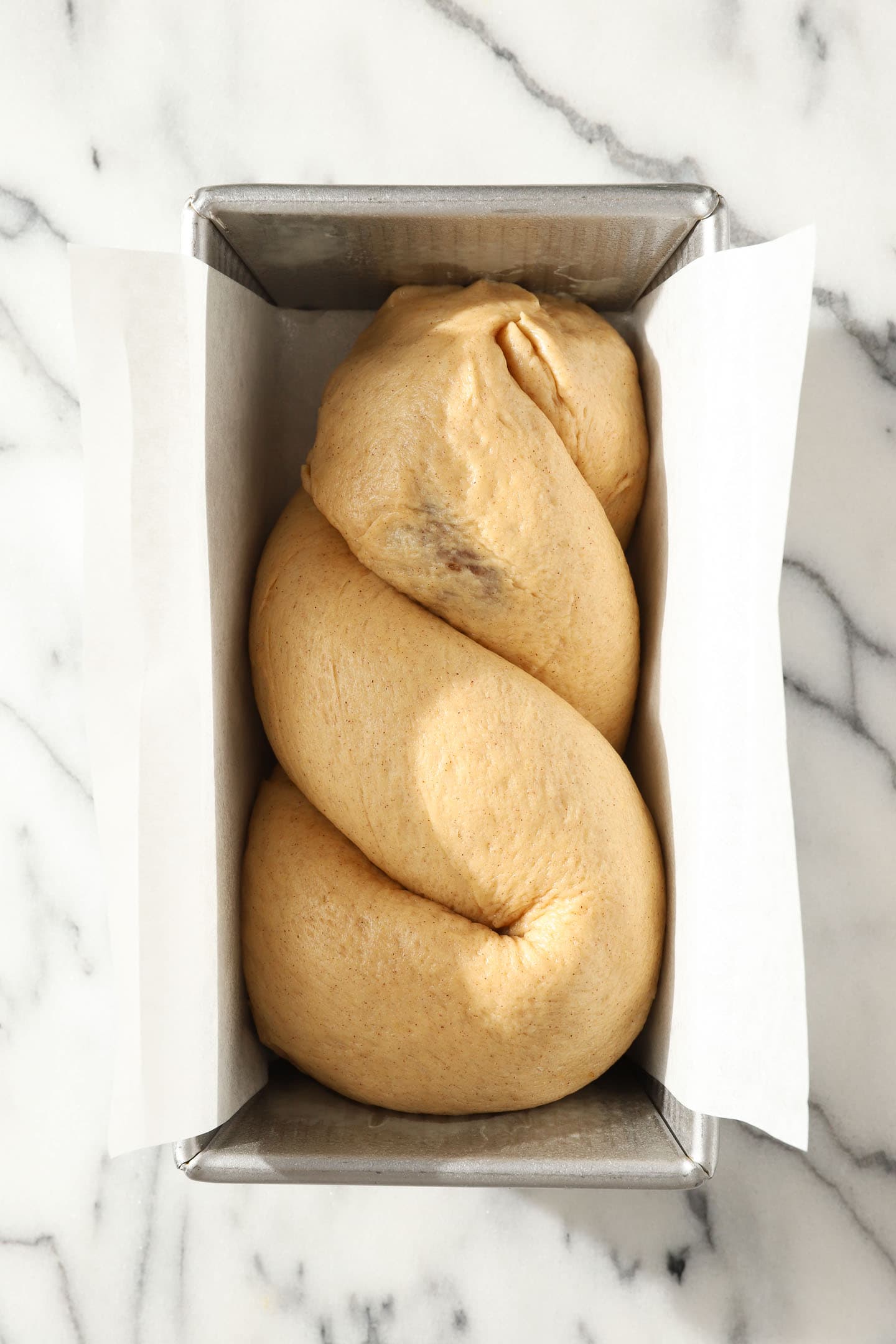 shaped, pre-risen loaf of apple babka