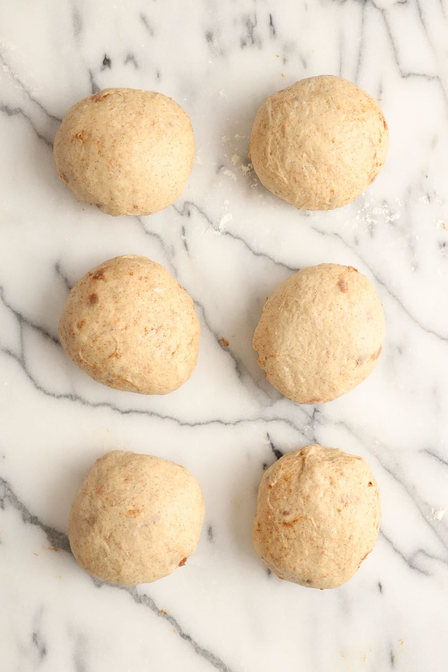 six round shaped dough pieces