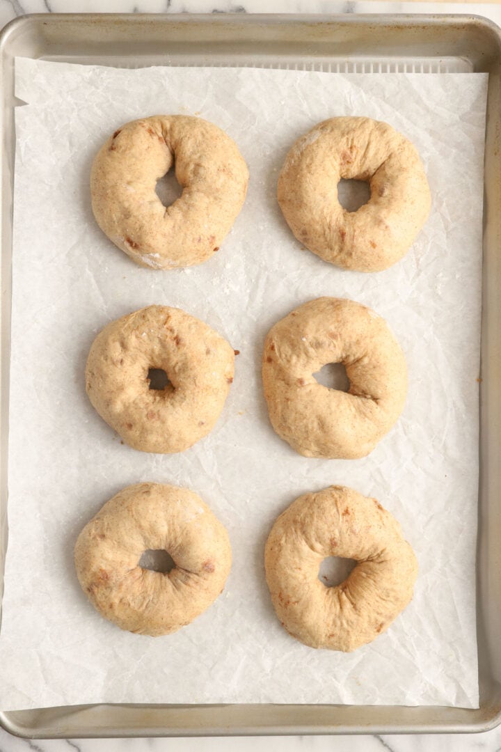 tray of unbaked, plain cinnamon bagels