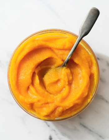 small glass bowl of fresh pumpkin puree.