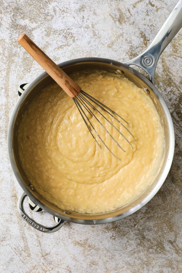 large saucepan of cooked coconut cream custard.