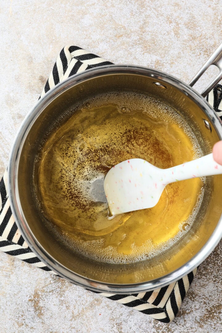 clear butter that has been browned in a silver saucepan.