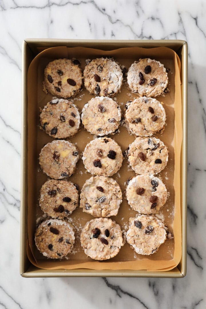 full tray of brown bread biscuits before being baked.