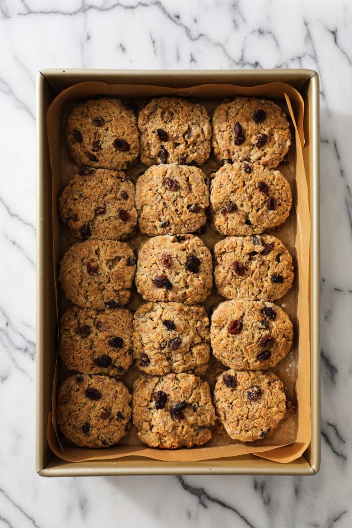 full tray of baked brown bread raisin biscuits.